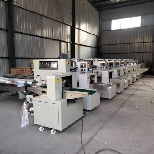 水晶餐具包装机 上走膜枕式包装机价格