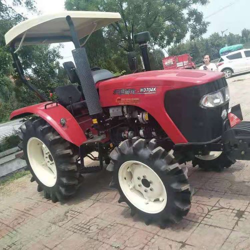 沃得704农用四轮拖拉机 水旱两用四驱耕地机 8+8梭式换挡