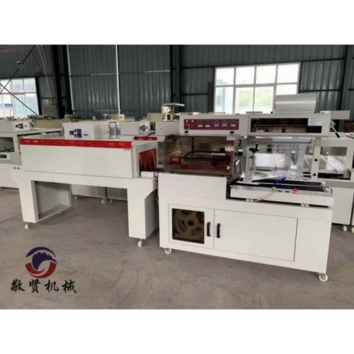 背包热收缩膜机 时尚包全自动包装 厂家直销