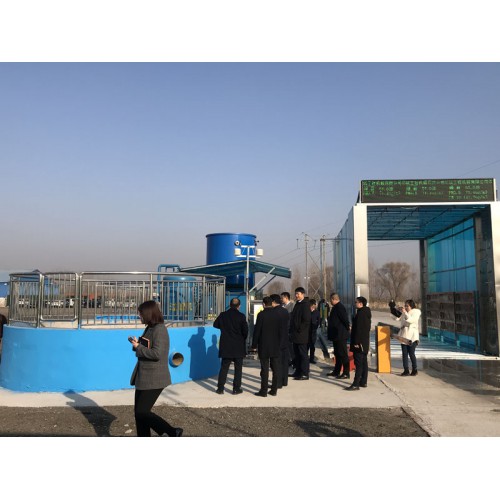 坤强运输安装韩强带污水处理全封闭式龙门洗车机