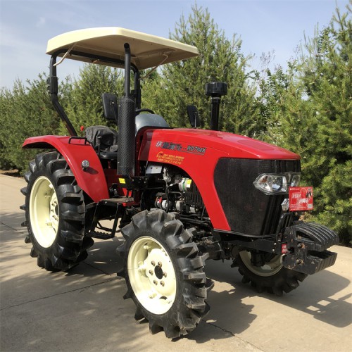 沃得704水旱两用拖拉机 四驱四缸多功能耕地犁地机