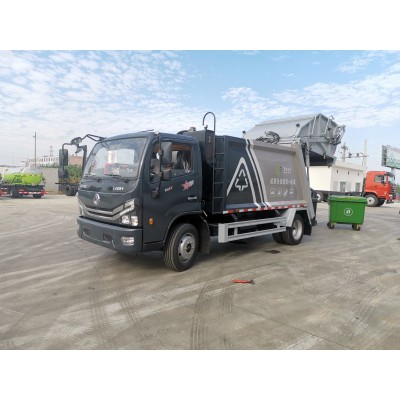 东风多利卡8方压缩垃圾车 可上京牌
